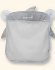 Mesh bath toy organizer bag on bathroom tiles