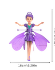 Flying fairy toy glowing in a child's hand – view 2